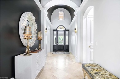 Nestled within the prestigious Pelican Marsh, this recently on Pelican Marsh Golf Club in Florida - for sale on GolfHomes.com, golf home, golf lot