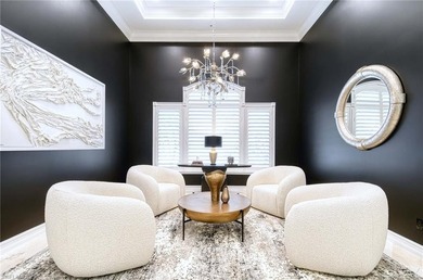 Nestled within the prestigious Pelican Marsh, this recently on Pelican Marsh Golf Club in Florida - for sale on GolfHomes.com, golf home, golf lot