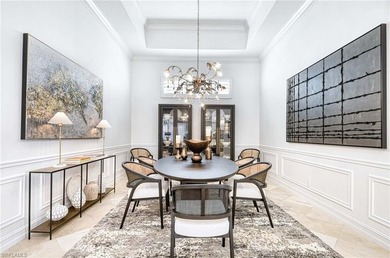 Nestled within the prestigious Pelican Marsh, this recently on Pelican Marsh Golf Club in Florida - for sale on GolfHomes.com, golf home, golf lot