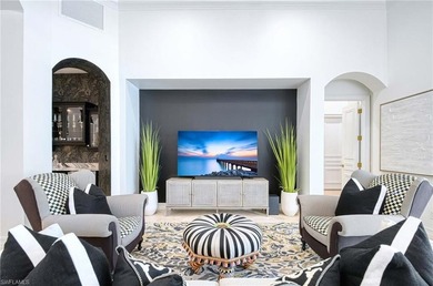 Nestled within the prestigious Pelican Marsh, this recently on Pelican Marsh Golf Club in Florida - for sale on GolfHomes.com, golf home, golf lot