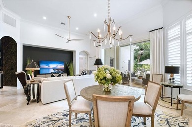 Nestled within the prestigious Pelican Marsh, this recently on Pelican Marsh Golf Club in Florida - for sale on GolfHomes.com, golf home, golf lot