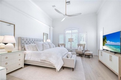 Nestled within the prestigious Pelican Marsh, this recently on Pelican Marsh Golf Club in Florida - for sale on GolfHomes.com, golf home, golf lot