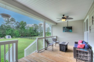 Welcome to this amazing home on a large manicured, level and on Spring Lake Country Club in South Carolina - for sale on GolfHomes.com, golf home, golf lot