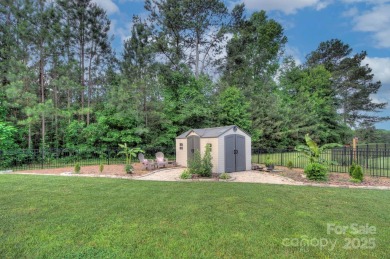 Welcome to this amazing home on a large manicured, level and on Spring Lake Country Club in South Carolina - for sale on GolfHomes.com, golf home, golf lot