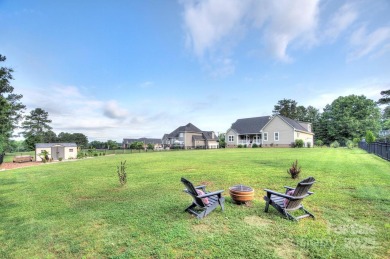 Welcome to this amazing home on a large manicured, level and on Spring Lake Country Club in South Carolina - for sale on GolfHomes.com, golf home, golf lot