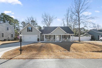 Nestled in the serene golf course community of Colonial Charters on Palmetto Greens Golf and Country Club in South Carolina - for sale on GolfHomes.com, golf home, golf lot