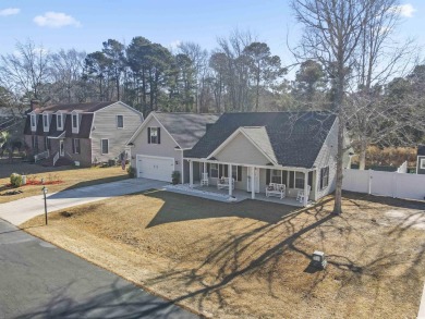 Nestled in the serene golf course community of Colonial Charters on Palmetto Greens Golf and Country Club in South Carolina - for sale on GolfHomes.com, golf home, golf lot