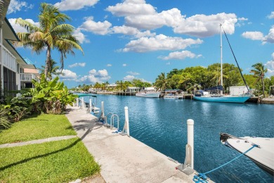 Nothing compares to waterfront living at Marathon Country Club on Sombrero Golf and Country Club in Florida - for sale on GolfHomes.com, golf home, golf lot