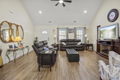 Nestled in the serene golf course community of Colonial Charters on Palmetto Greens Golf and Country Club in South Carolina - for sale on GolfHomes.com, golf home, golf lot