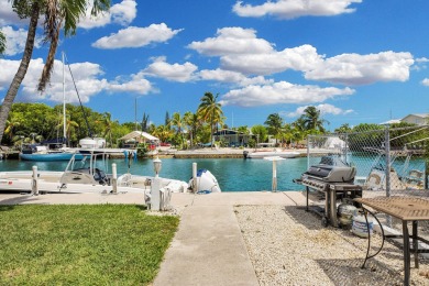 Nothing compares to waterfront living at Marathon Country Club on Sombrero Golf and Country Club in Florida - for sale on GolfHomes.com, golf home, golf lot