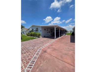 Welcome to 407 Dartmouth Dr., Haines City, FL - Florida Living on Sweetwater Golf and Tennis Club in Florida - for sale on GolfHomes.com, golf home, golf lot