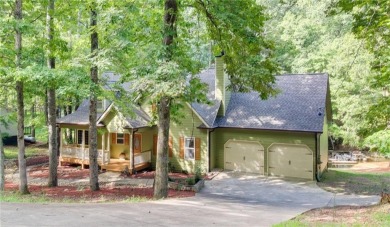 PRICE IMPROVEMENT - WATERFRONT RETREAT - located in the Lake on The Highlands Course at Lake Arrowhead in Georgia - for sale on GolfHomes.com, golf home, golf lot