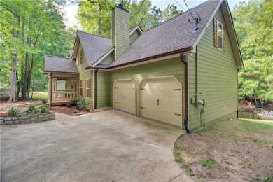 PRICE IMPROVEMENT - WATERFRONT RETREAT - located in the Lake on The Highlands Course at Lake Arrowhead in Georgia - for sale on GolfHomes.com, golf home, golf lot