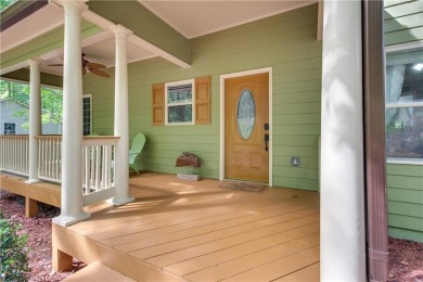 PRICE IMPROVEMENT - WATERFRONT RETREAT - located in the Lake on The Highlands Course at Lake Arrowhead in Georgia - for sale on GolfHomes.com, golf home, golf lot