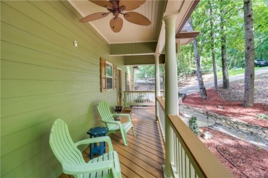 PRICE IMPROVEMENT - WATERFRONT RETREAT - located in the Lake on The Highlands Course at Lake Arrowhead in Georgia - for sale on GolfHomes.com, golf home, golf lot