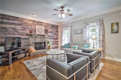 PRICE IMPROVEMENT - WATERFRONT RETREAT - located in the Lake on The Highlands Course at Lake Arrowhead in Georgia - for sale on GolfHomes.com, golf home, golf lot