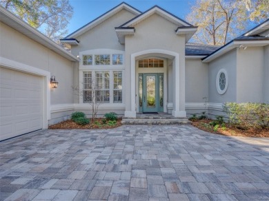 Welcome to this stunning single-level 4-bedroom, 3-bath POOL on Golf Club At North Hampton in Florida - for sale on GolfHomes.com, golf home, golf lot