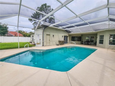 Discover Privacy and luxury in this 4 bedroom/ 3 full bath (plus on The Grand Club - Pine Lakes Course in Florida - for sale on GolfHomes.com, golf home, golf lot