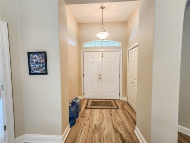 Discover Privacy and luxury in this 4 bedroom/ 3 full bath (plus on The Grand Club - Pine Lakes Course in Florida - for sale on GolfHomes.com, golf home, golf lot