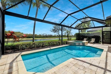 Enjoy captivating lake views from this impeccably turnkey with on The Rookery At Marco in Florida - for sale on GolfHomes.com, golf home, golf lot