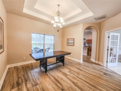 Discover Privacy and luxury in this 4 bedroom/ 3 full bath (plus on The Grand Club - Pine Lakes Course in Florida - for sale on GolfHomes.com, golf home, golf lot