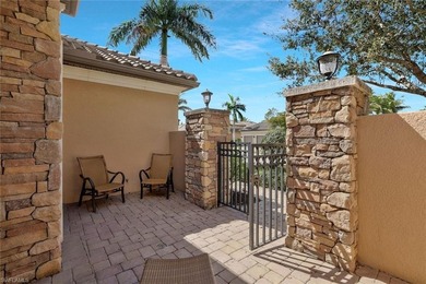 Enjoy captivating lake views from this impeccably turnkey with on The Rookery At Marco in Florida - for sale on GolfHomes.com, golf home, golf lot