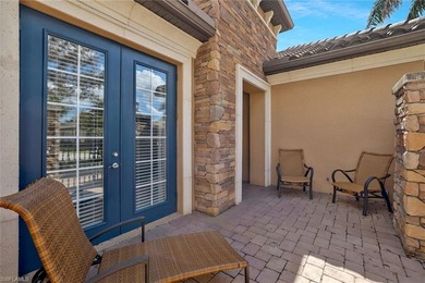 Enjoy captivating lake views from this impeccably turnkey with on The Rookery At Marco in Florida - for sale on GolfHomes.com, golf home, golf lot