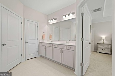 Welcome to this stunning coastal retreat in prestigious Savannah on Savannah Quarters Country Club in Georgia - for sale on GolfHomes.com, golf home, golf lot