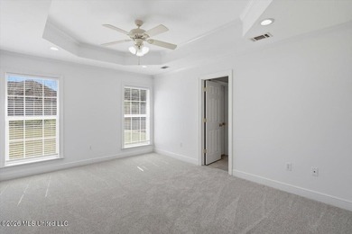 This thoughtfully designed home offers quality construction on Patrick Farms Golf Club in Mississippi - for sale on GolfHomes.com, golf home, golf lot