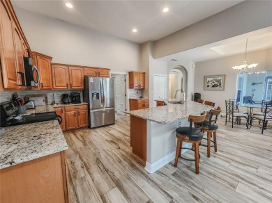Discover Privacy and luxury in this 4 bedroom/ 3 full bath (plus on The Grand Club - Pine Lakes Course in Florida - for sale on GolfHomes.com, golf home, golf lot