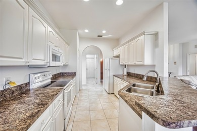 Welcome home to 3343 Via Montana Way! Approximately 1700 sq ft on Herons Glen Golf and Country Club in Florida - for sale on GolfHomes.com, golf home, golf lot