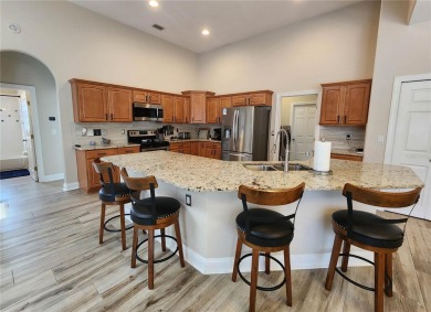 Discover Privacy and luxury in this 4 bedroom/ 3 full bath (plus on The Grand Club - Pine Lakes Course in Florida - for sale on GolfHomes.com, golf home, golf lot