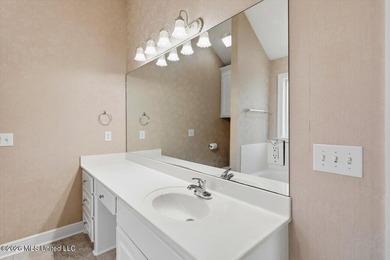 This thoughtfully designed home offers quality construction on Patrick Farms Golf Club in Mississippi - for sale on GolfHomes.com, golf home, golf lot