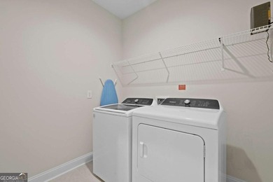 Welcome to this stunning coastal retreat in prestigious Savannah on Savannah Quarters Country Club in Georgia - for sale on GolfHomes.com, golf home, golf lot