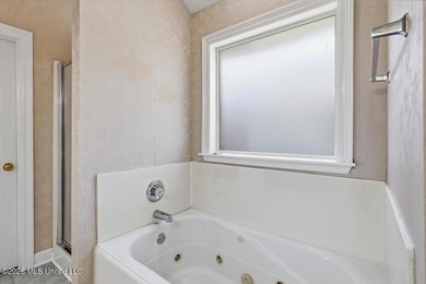 This thoughtfully designed home offers quality construction on Patrick Farms Golf Club in Mississippi - for sale on GolfHomes.com, golf home, golf lot