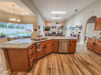 Discover Privacy and luxury in this 4 bedroom/ 3 full bath (plus on The Grand Club - Pine Lakes Course in Florida - for sale on GolfHomes.com, golf home, golf lot
