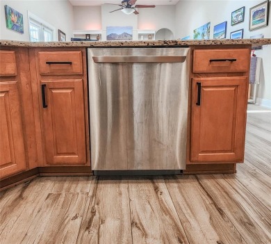 Discover Privacy and luxury in this 4 bedroom/ 3 full bath (plus on The Grand Club - Pine Lakes Course in Florida - for sale on GolfHomes.com, golf home, golf lot