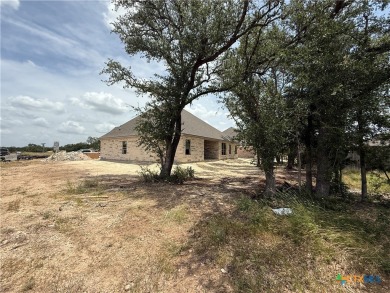 Talk about location and mature trees plus only a short golf cart on Mill Creek Golf Club in Texas - for sale on GolfHomes.com, golf home, golf lot