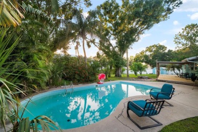 One or more photo(s) has been virtually staged. Welcome to Shore on Mangrove Bay Golf Course in Florida - for sale on GolfHomes.com, golf home, golf lot