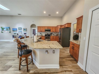 Discover Privacy and luxury in this 4 bedroom/ 3 full bath (plus on The Grand Club - Pine Lakes Course in Florida - for sale on GolfHomes.com, golf home, golf lot