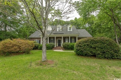 A stunning brick ranch style home with an inviting southern on Wachesaw Plantation Club in South Carolina - for sale on GolfHomes.com, golf home, golf lot