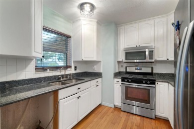 One or more photo(s) has been virtually staged. Welcome to Shore on Mangrove Bay Golf Course in Florida - for sale on GolfHomes.com, golf home, golf lot