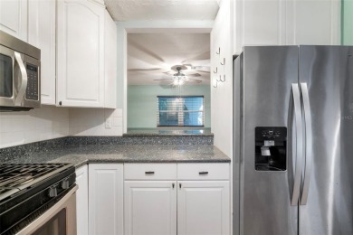 One or more photo(s) has been virtually staged. Welcome to Shore on Mangrove Bay Golf Course in Florida - for sale on GolfHomes.com, golf home, golf lot