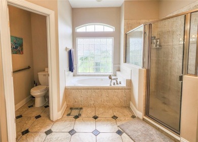 Discover Privacy and luxury in this 4 bedroom/ 3 full bath (plus on The Grand Club - Pine Lakes Course in Florida - for sale on GolfHomes.com, golf home, golf lot