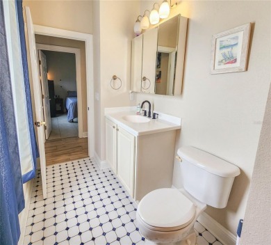 Discover Privacy and luxury in this 4 bedroom/ 3 full bath (plus on The Grand Club - Pine Lakes Course in Florida - for sale on GolfHomes.com, golf home, golf lot