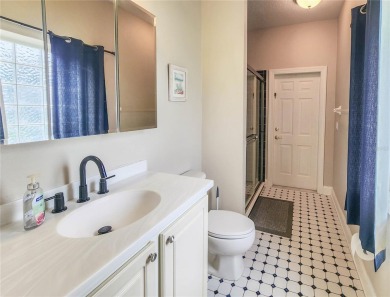 Discover Privacy and luxury in this 4 bedroom/ 3 full bath (plus on The Grand Club - Pine Lakes Course in Florida - for sale on GolfHomes.com, golf home, golf lot