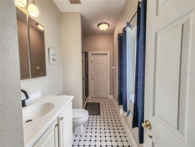 Discover Privacy and luxury in this 4 bedroom/ 3 full bath (plus on The Grand Club - Pine Lakes Course in Florida - for sale on GolfHomes.com, golf home, golf lot
