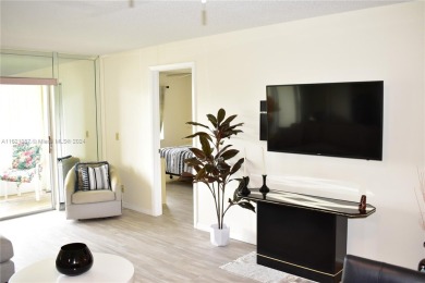 This furnished, turnkey, top floor condo features all new on Sunrise Lakes Phase III in Florida - for sale on GolfHomes.com, golf home, golf lot