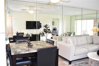 This furnished, turnkey, top floor condo features all new on Sunrise Lakes Phase III in Florida - for sale on GolfHomes.com, golf home, golf lot