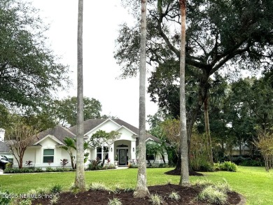 Discover your dream home in the exclusive Queens Harbour Yacht & on Queens Harbour Yacht and Country Club in Florida - for sale on GolfHomes.com, golf home, golf lot
